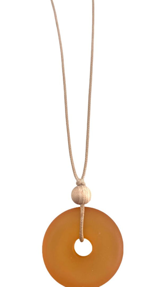 Orange frosted resin pendant with wood bead adjustable cord