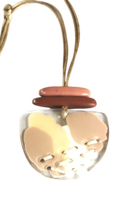 Cream resin pendant